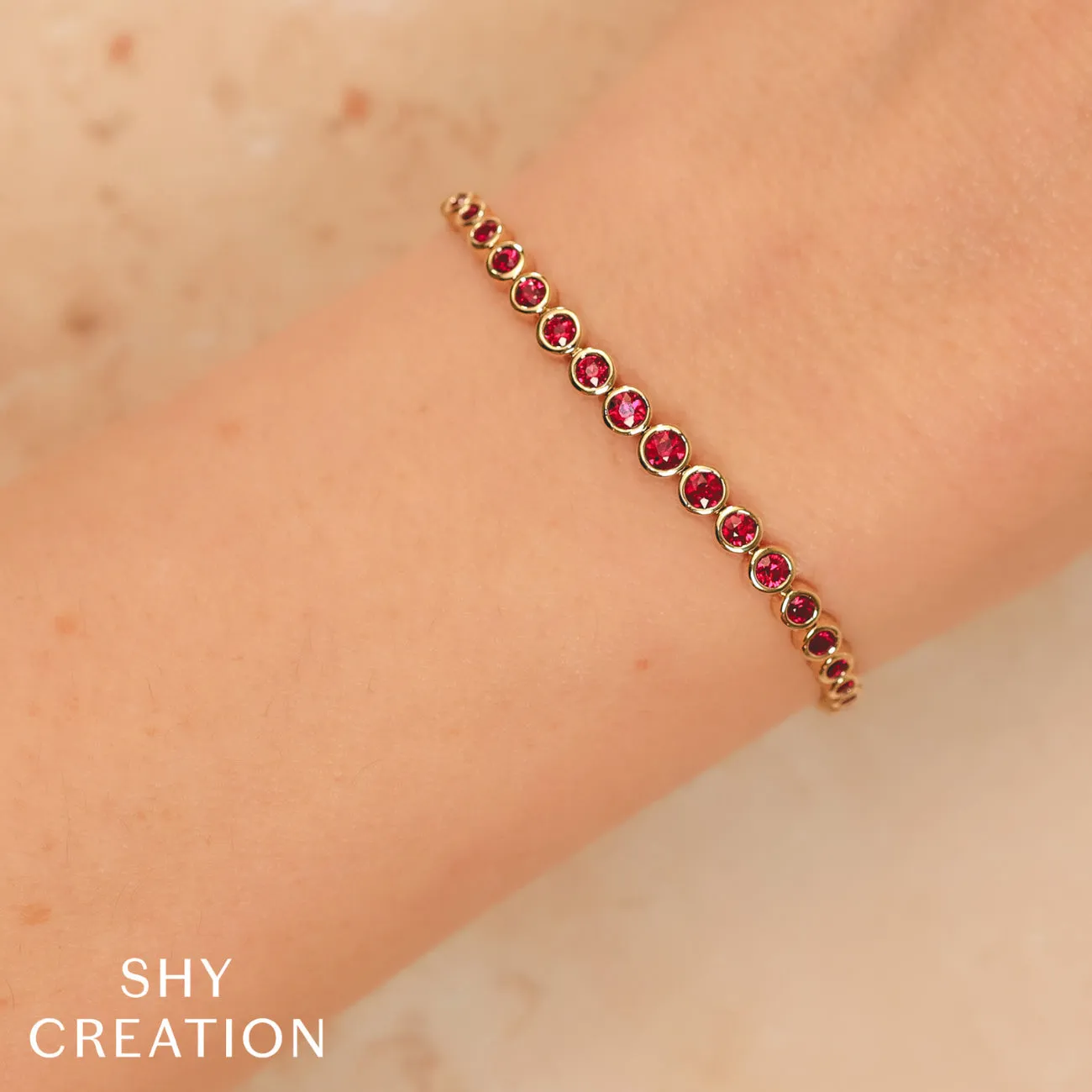 14K Yellow Gold Ruby Graduated Bezel Tennis Bracelet