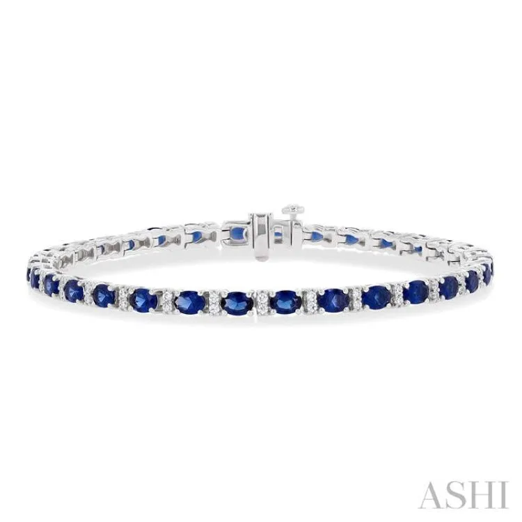 4X3 MM Oval Cut Sapphire and 1/3 ctw Round Cut Diamond Precious Bracelet in 14K White Gold