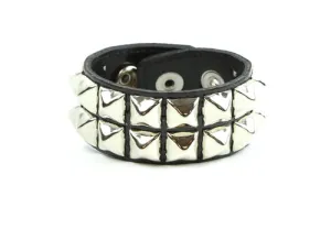 Black patent leather bracelet w/ 2 rows of silver pyramid studs