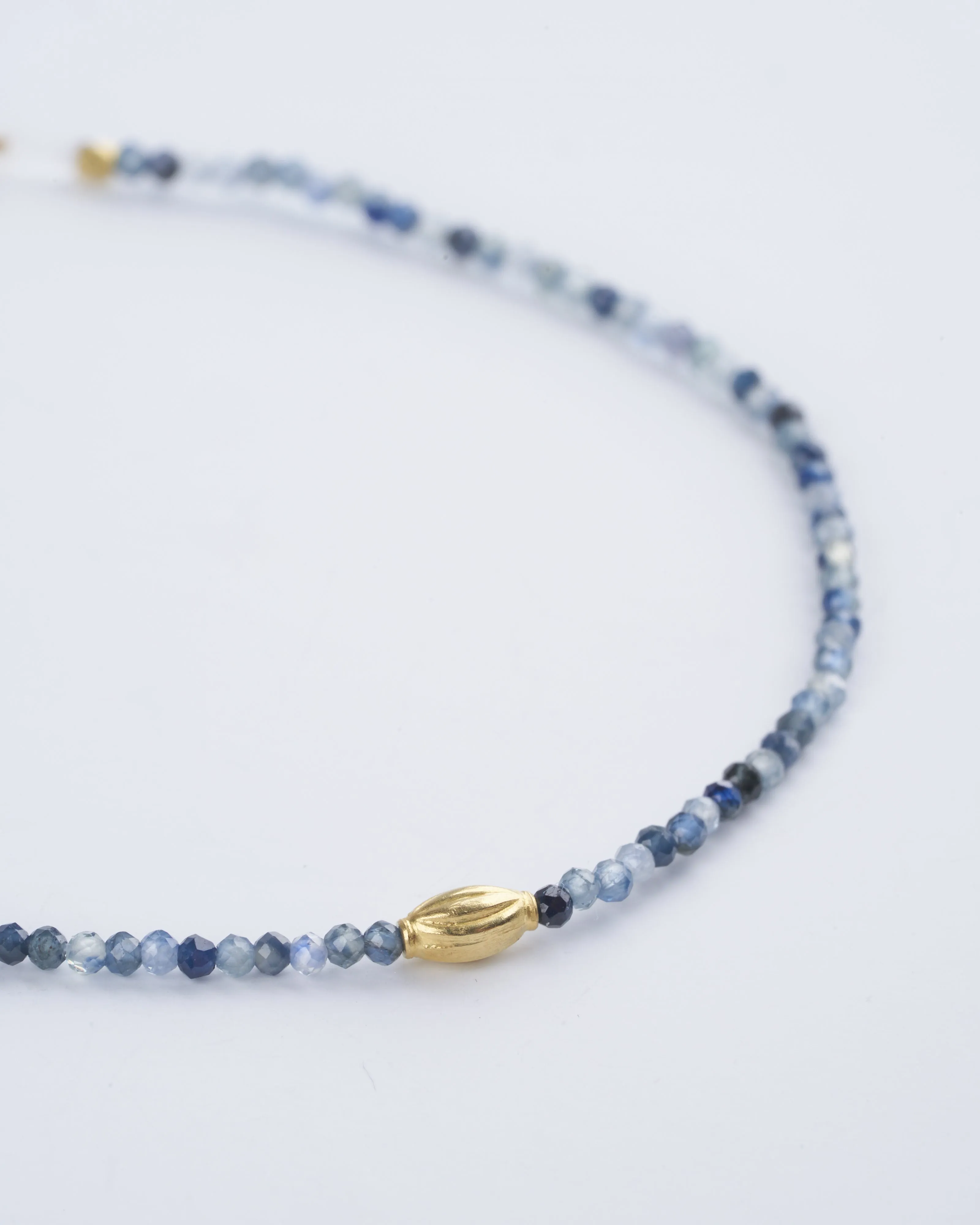 blue sapphire bracelet with gold pod bracelet - 18k yellow gold