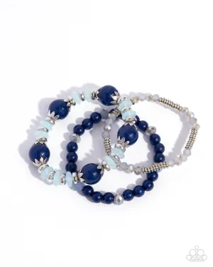 Flashy Frugality - Blue - Crystal-like and UV Bead Paparazzi Stretchy Bracelet