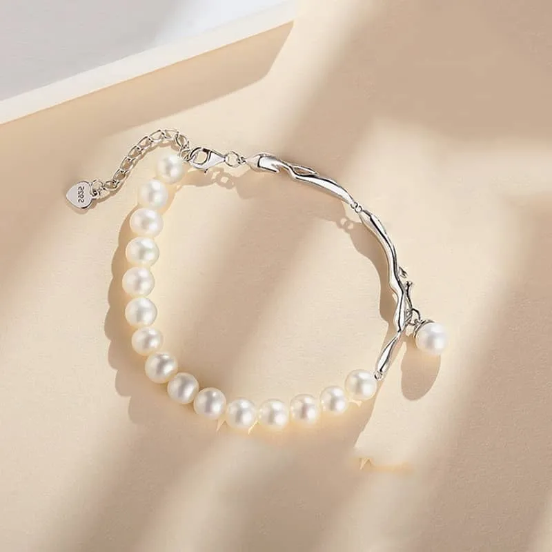Freshwater Pearl and Silver Brach with a Pearl Charm Bracelet