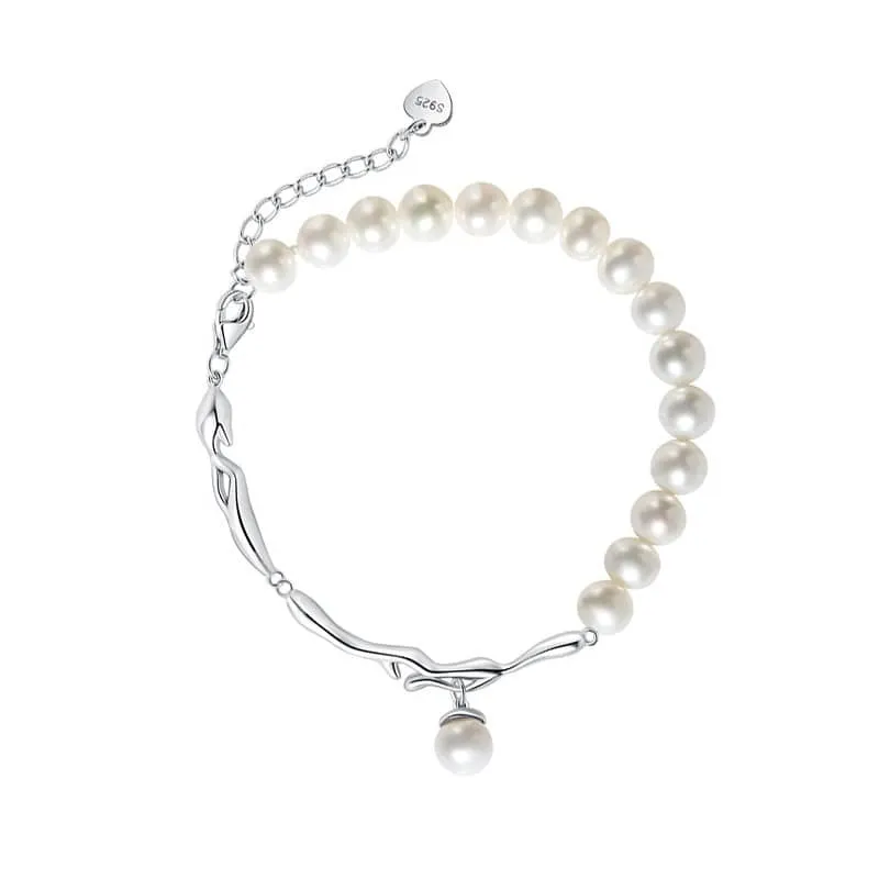 Freshwater Pearl and Silver Brach with a Pearl Charm Bracelet