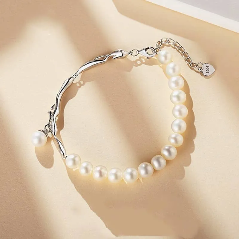 Freshwater Pearl and Silver Brach with a Pearl Charm Bracelet