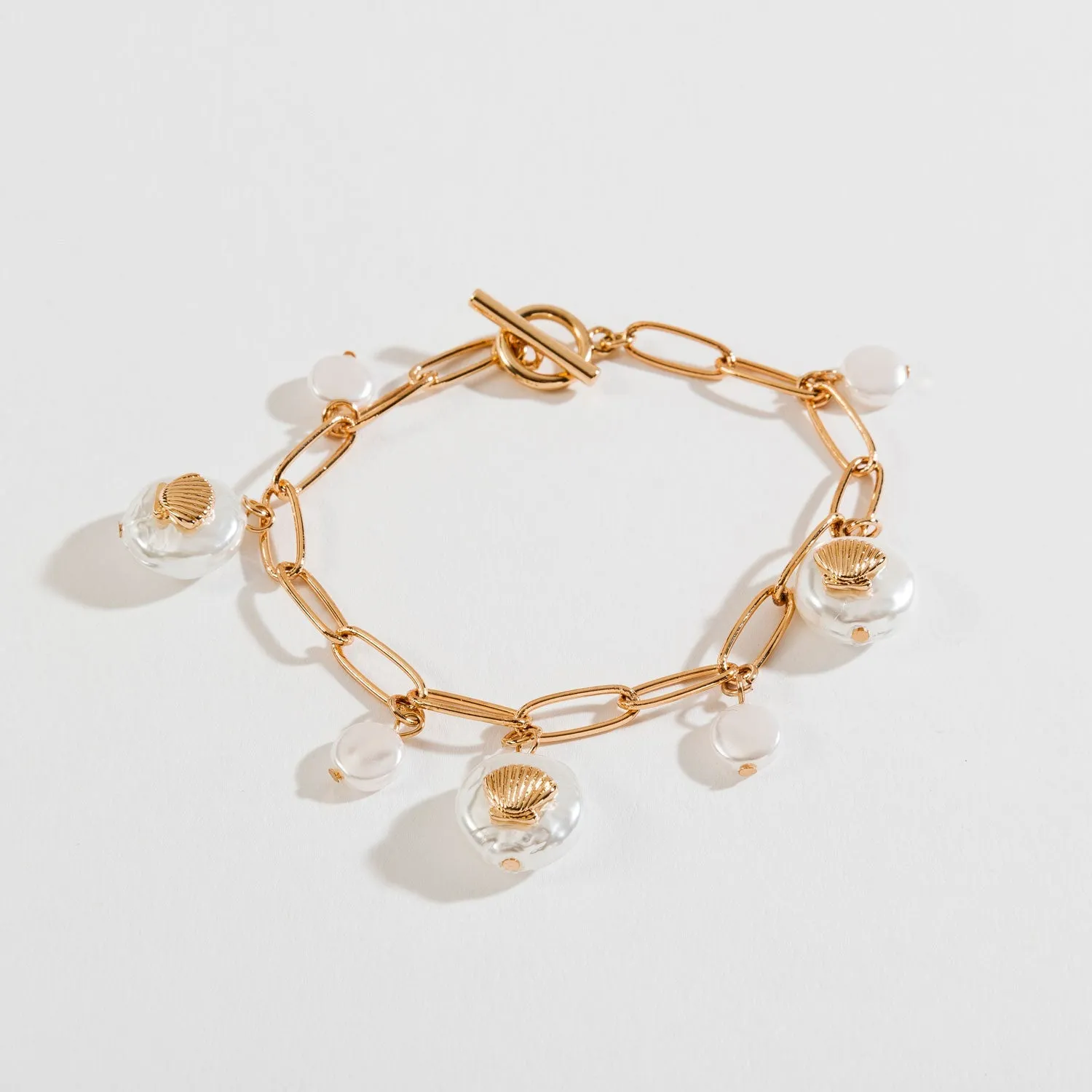 Gold Pearl And Shell Charm Bracelet