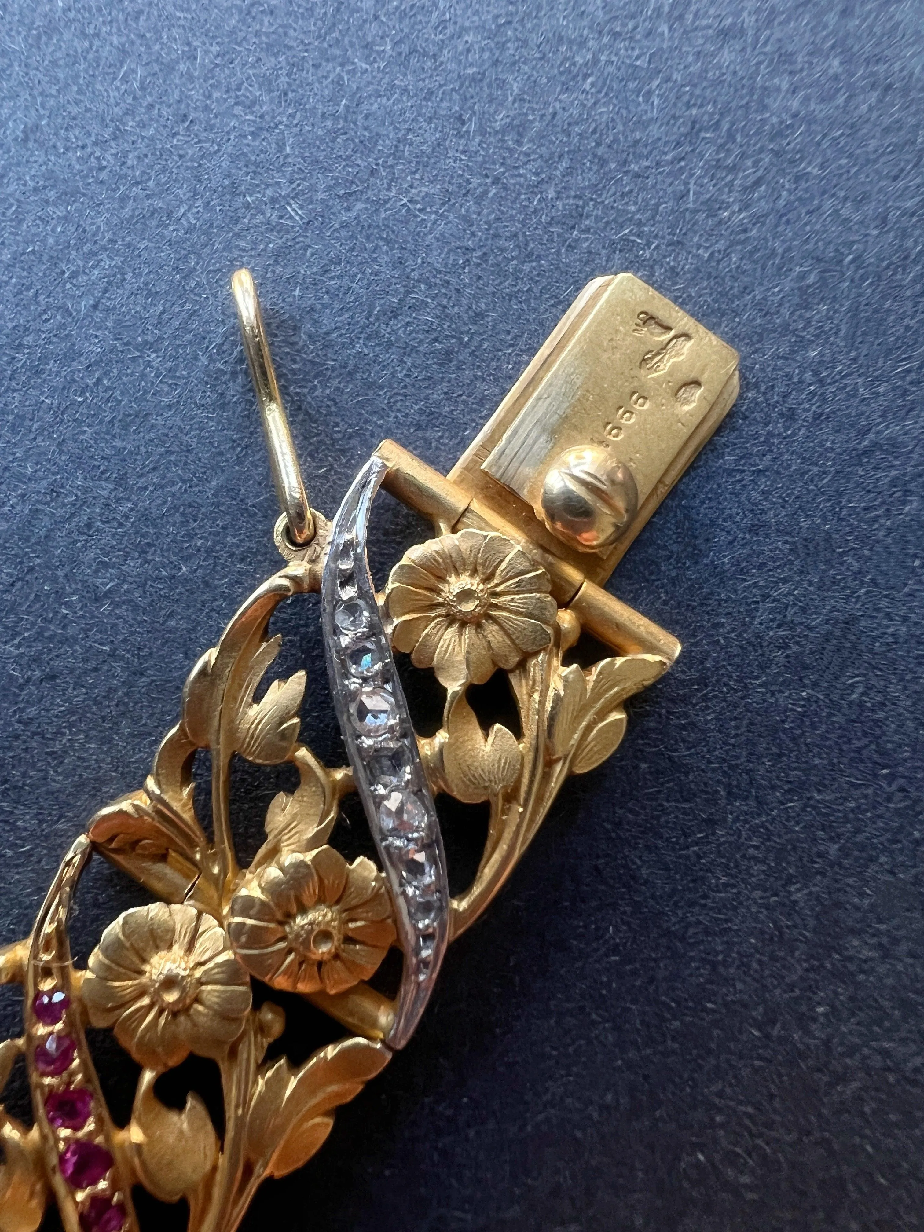 Museum quality French Art Nouveau 18K gold diamond ruby flower bracelet