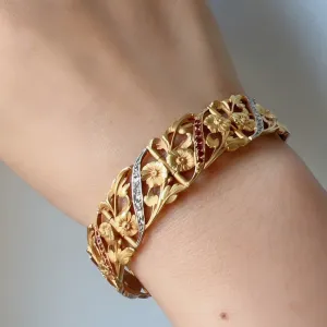 Museum quality French Art Nouveau 18K gold diamond ruby flower bracelet