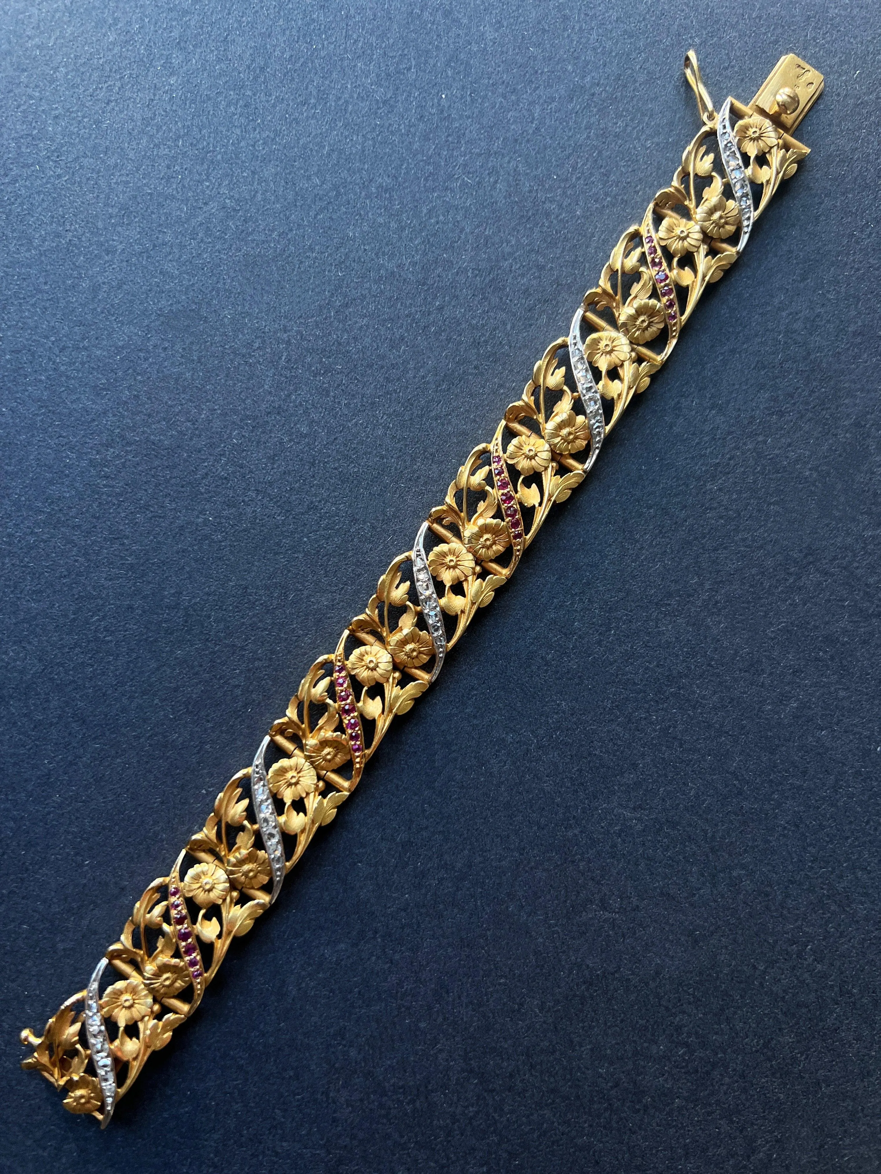 Museum quality French Art Nouveau 18K gold diamond ruby flower bracelet
