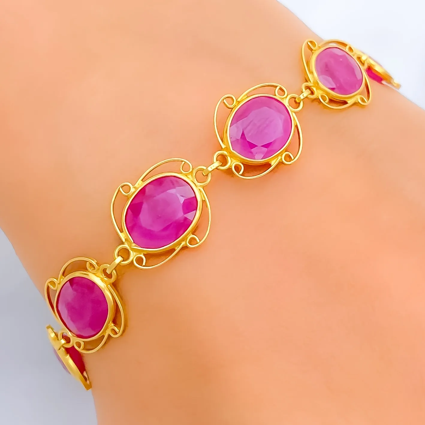 Vibrant Oval Ruby Motif 22k Gold Bracelet